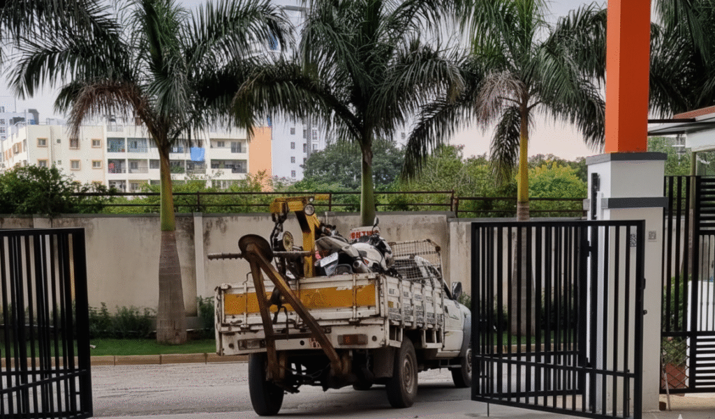 Vehicle towing truck at facility entrance