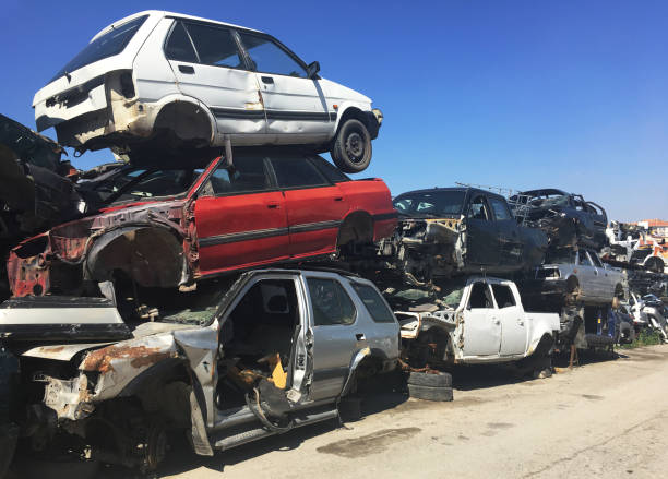 Pile of scrapped cars at recycling yard