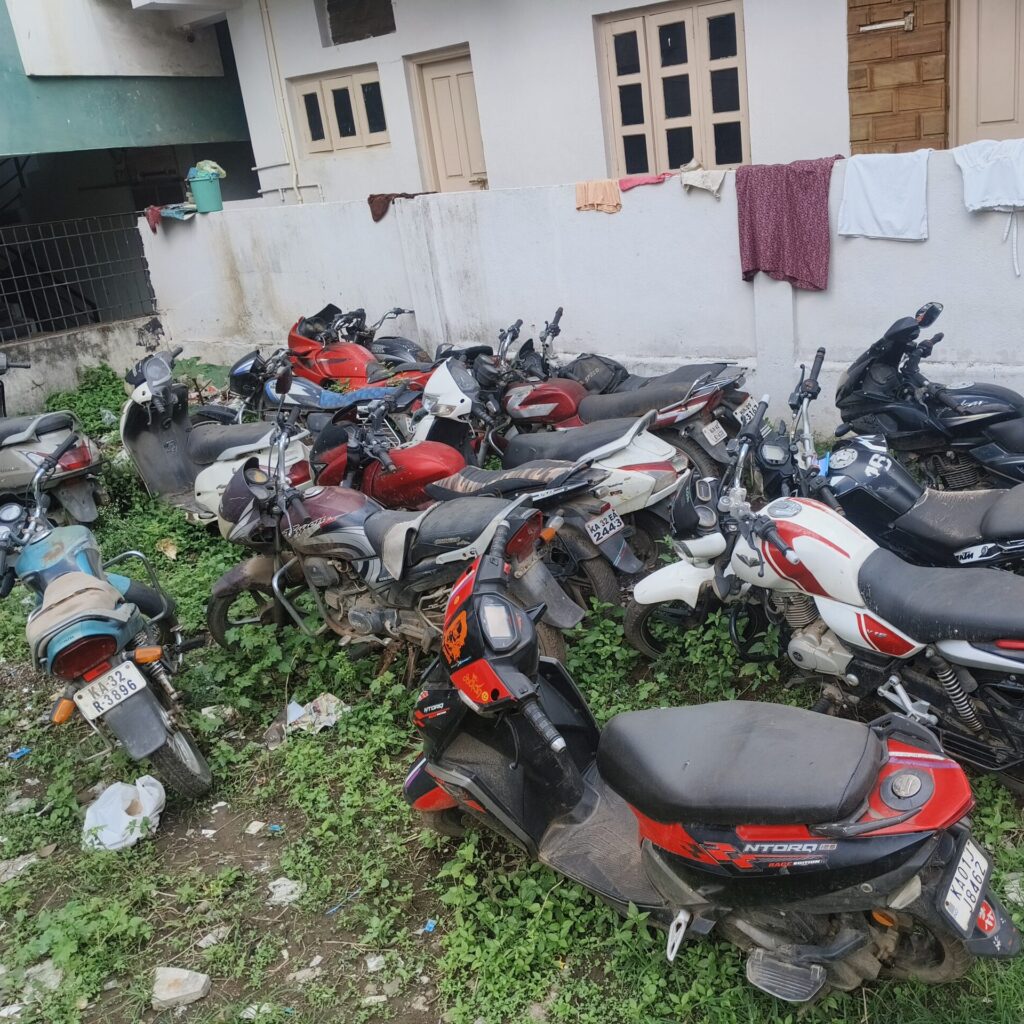 Bikes and scooters dumped in a scrap yard