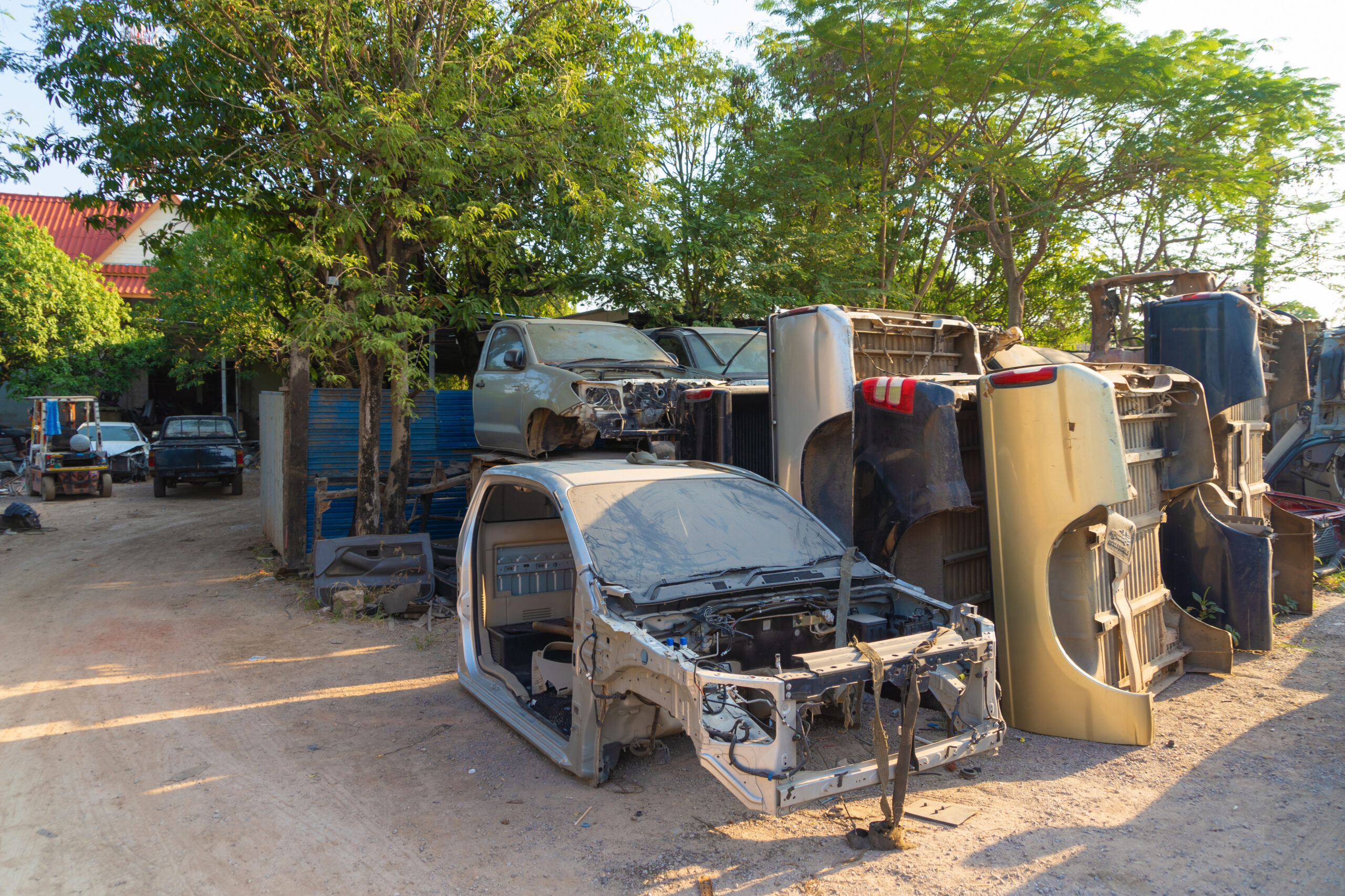 Industry factory of broken old cars crash from accidents. Transportation used vehicles.